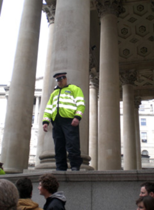 City cop looks down on crowd