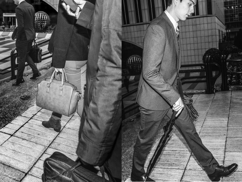 Das Einmaleins des Business-Outfits: Anzug, Aktentasche, Regenschirm.