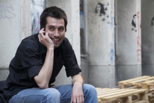 Dobrica telephoning the Belgrade street gallery